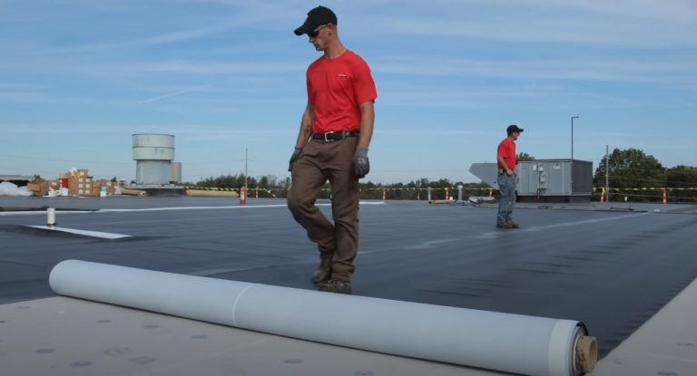 roofers doing Protective Flat Roof Layer